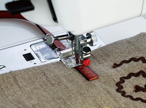 Лапка роликовая для машин с вертикальным челноком